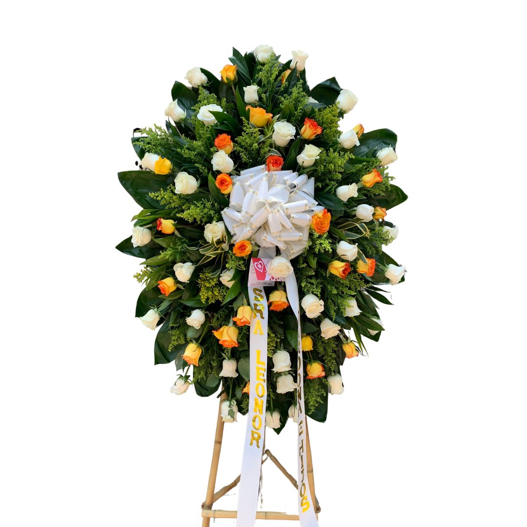 Corona fúnebre con rosas blancas y amarillo confeti