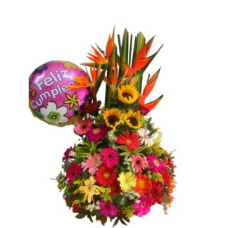Arreglo tropical con girasoles, heliconias, gerberas y globo metálico