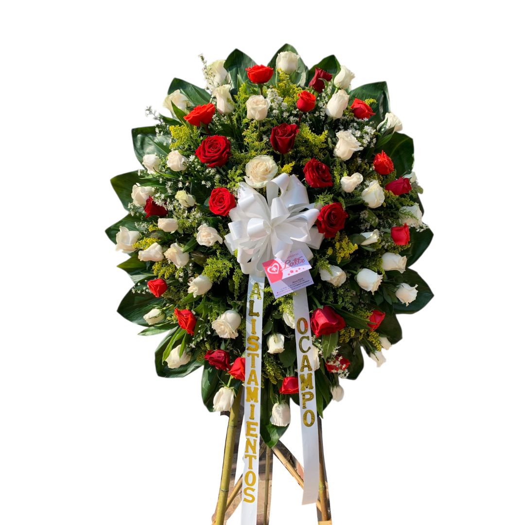 Corona fúnebre en rosas rojas y blancas