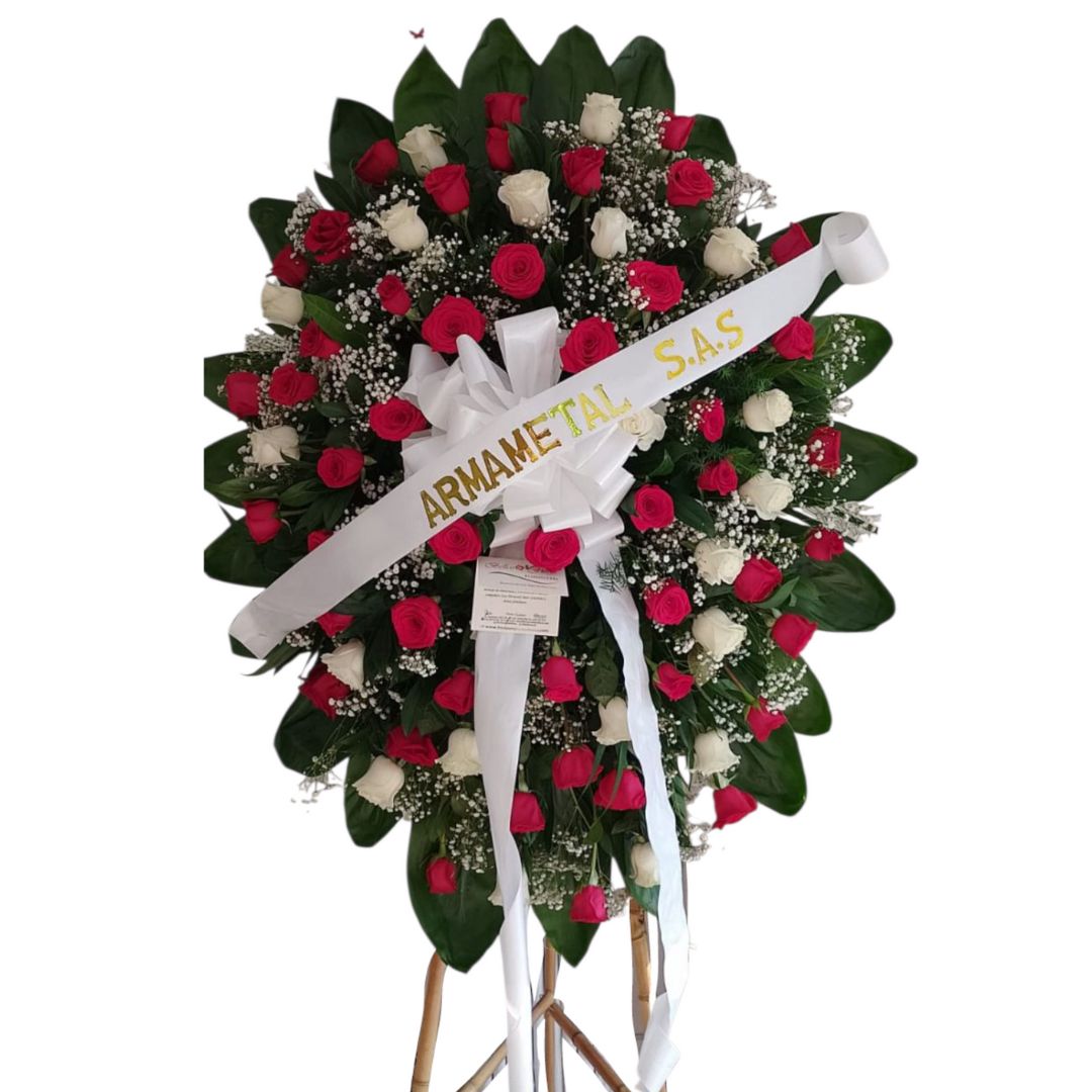 Corona fúnebre con rosas rojas y blancas frescas