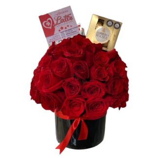 Arreglo redondo de rosas rojas con Ferrero Rocher.