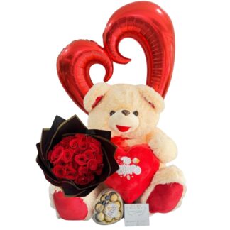 Buchón de rosas rojas con Ferrero Rocher, peluche y globo metalizado.