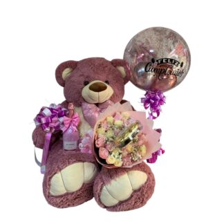 Oso con buquet de rosas, chocolates Ferrero Rocher, licor J.P. y globo burbuja.