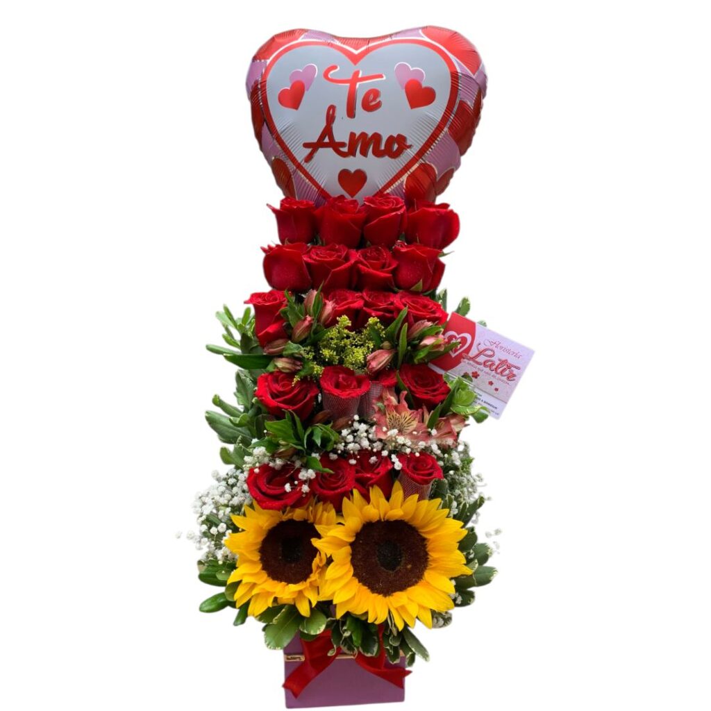 Arreglo lineal de rosas rojas, astromelias y girasoles con globo metalizado.